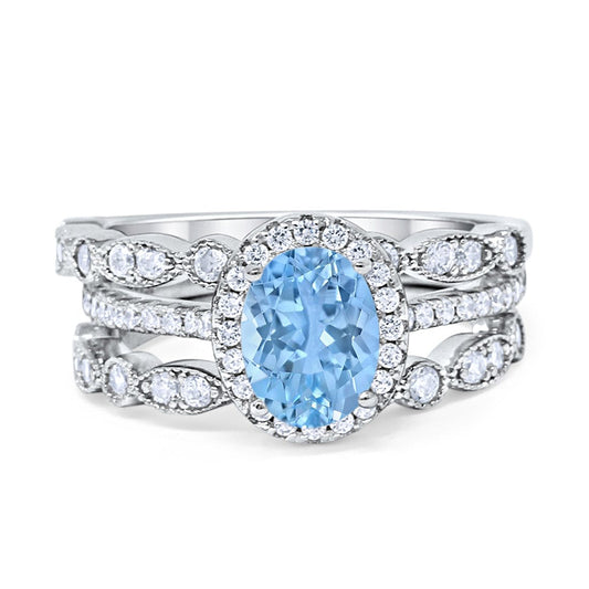 Three Piece Halo Engagement Ring Oval Simulated Aquamarine CZ